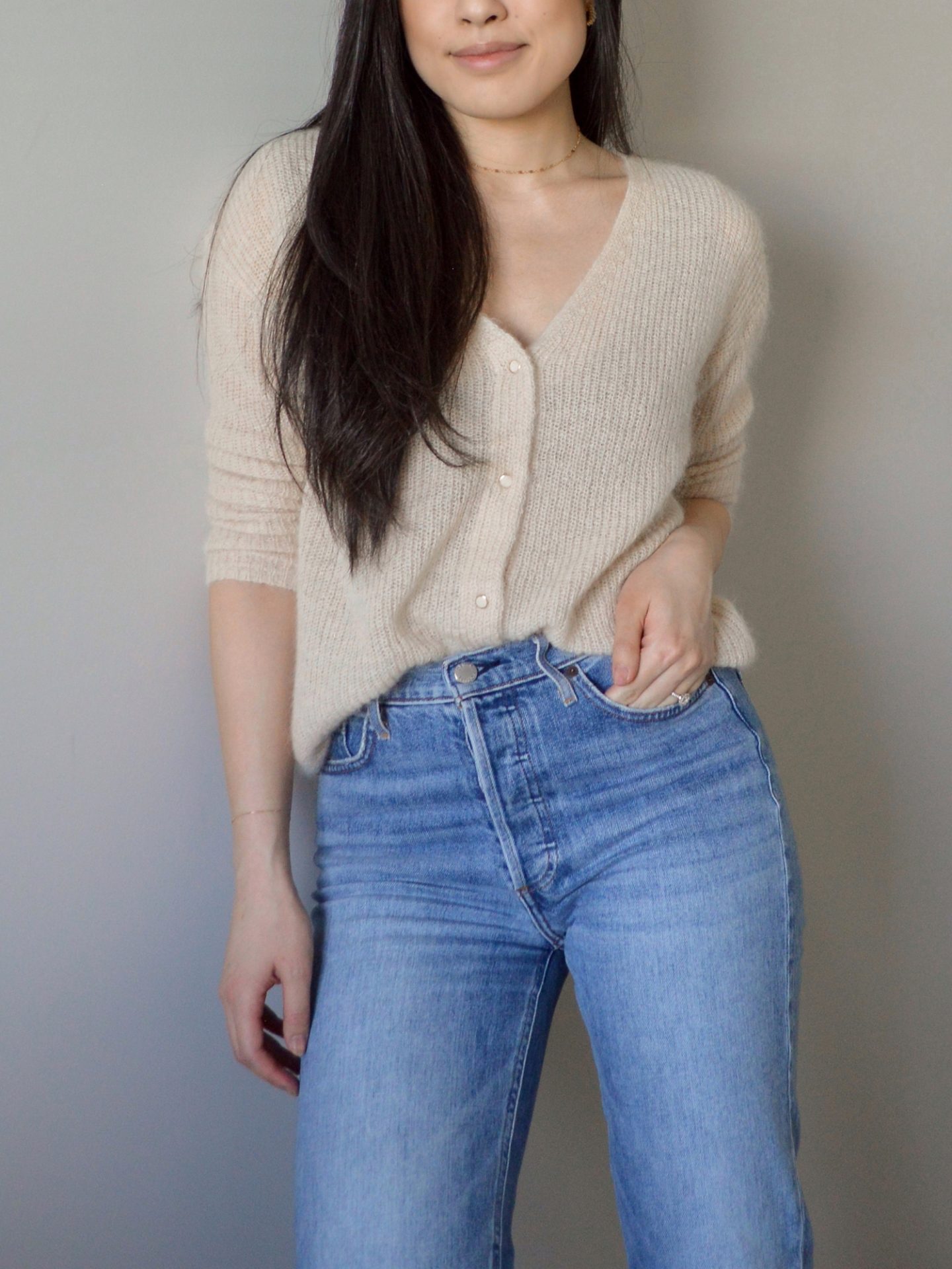 Outfit details: Knit sweater cardigan, blue straight jeans