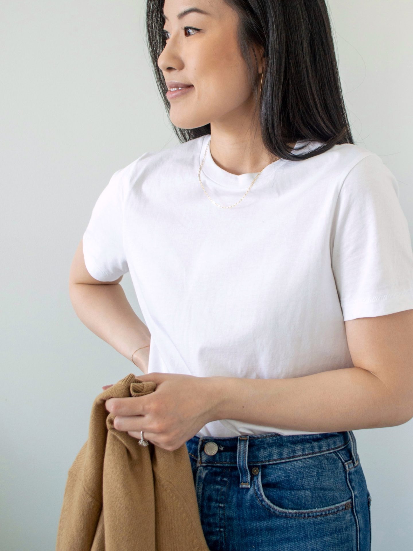 Her Simple Sole - wearing Sheena Marshall Jewelry. Delicate gold jewelry. White crewneck t-shirt, Everlane cashmere crew in camel, cashmere sweater