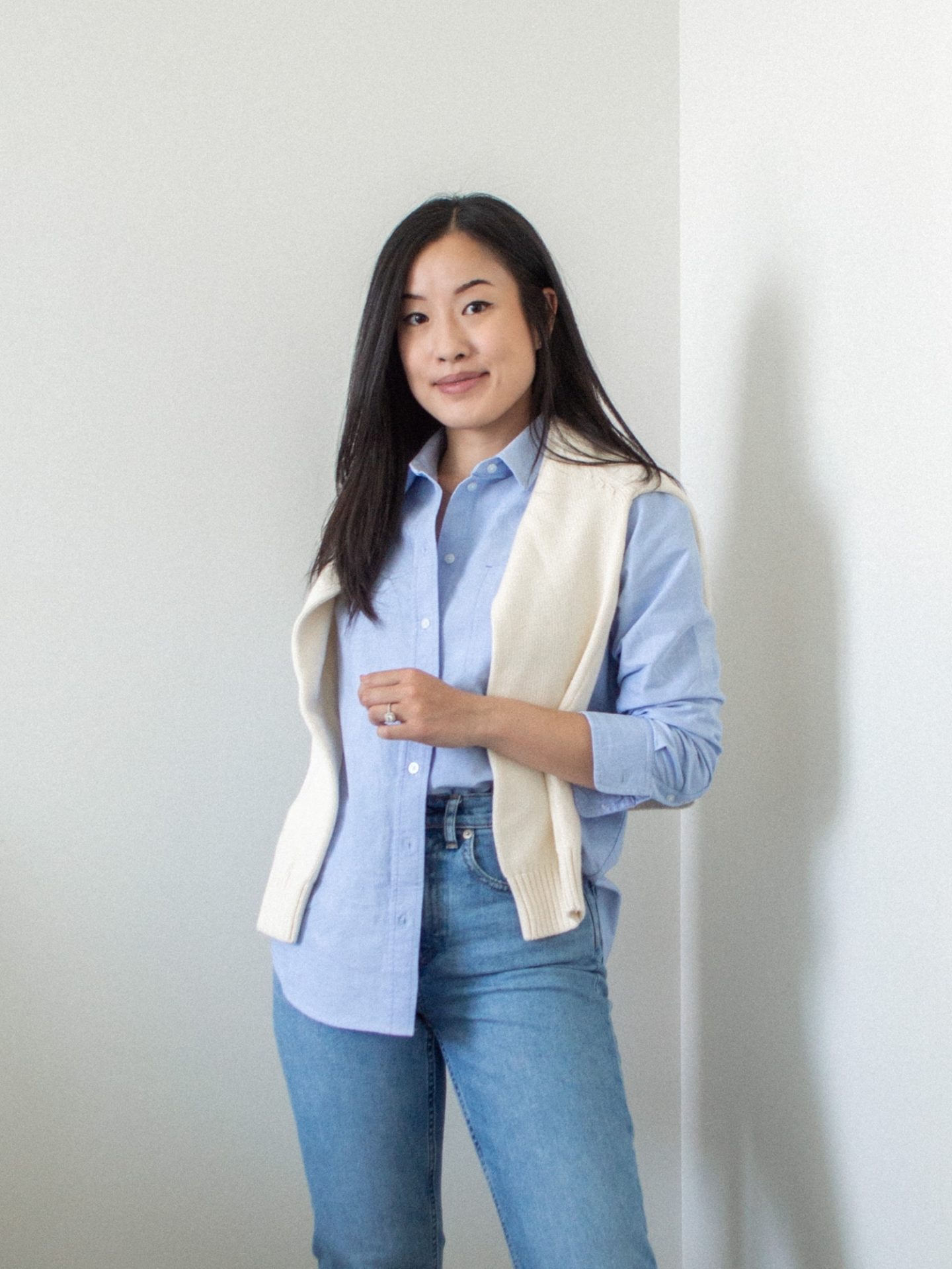 Outfit details - Everlane Relaxed Oxford Shirt, Able Lily Pullover Sweater, Everlane Original Cheeky Jeans, blue shit outfit, oxford shirt outfit, transitional summer to fall style