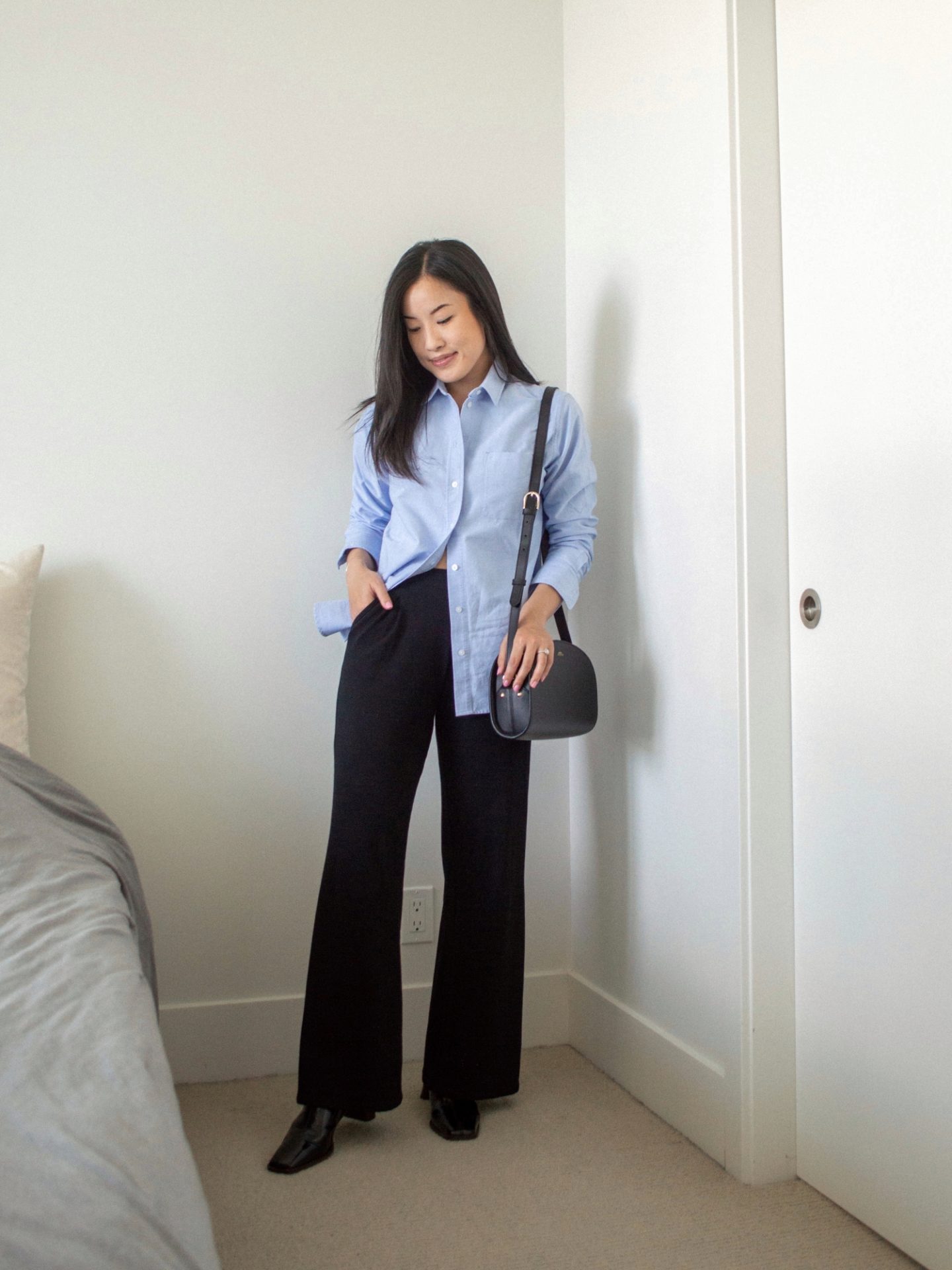 Outfit details - Everlane Relaxed Oxford Shirt, Encircled Comfy Wide Leg Pant, L'intervalle Lilia Mules, A.P.C. Black Demi-Lune Bag, blue shit outfit, oxford shirt outfit, transitional summer to fall style