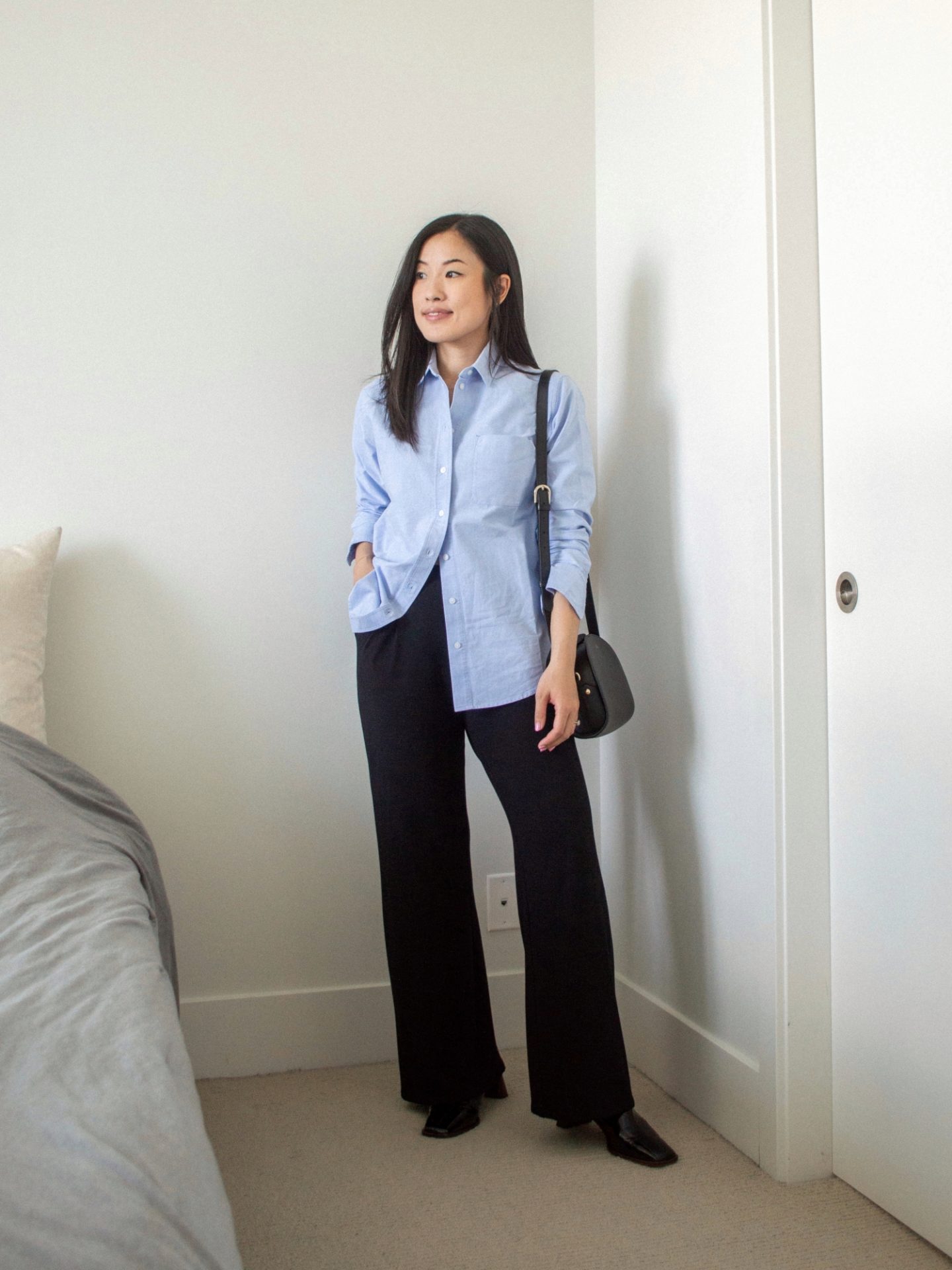 Outfit details - Everlane Relaxed Oxford Shirt, Encircled Comfy Wide Leg Pant, L'intervalle Lilia Mules, A.P.C. Black Demi-Lune Bag, blue shit outfit, oxford shirt outfit, transitional summer to fall style