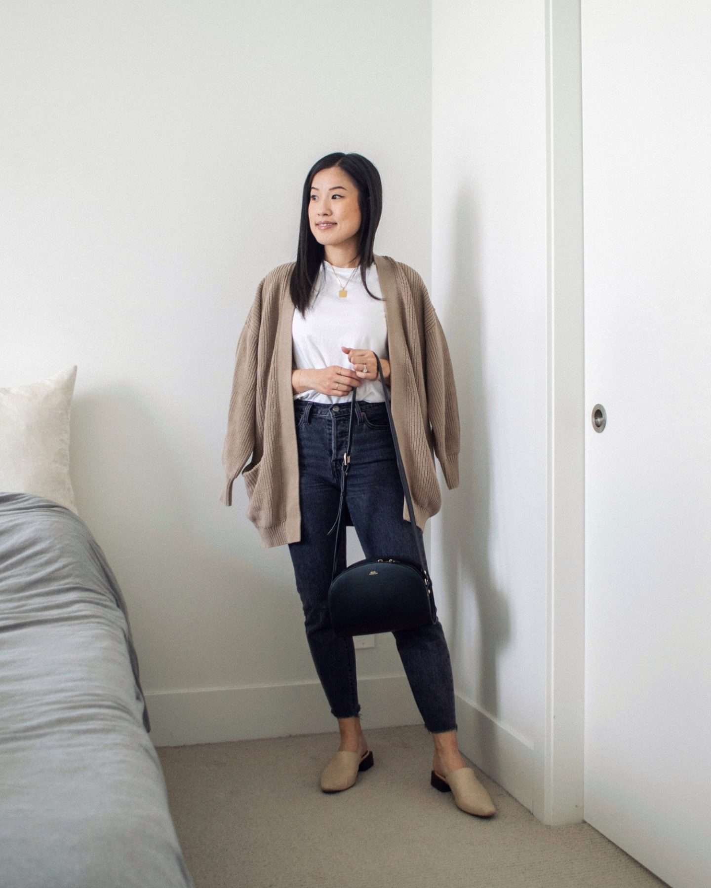 Outfit details - Paper Label Opal Cardi, Kotn Essential Crew, Levi's Wedgie Straight Jeans, Maguire Boutique Navio Mules, A.P.C. Black Demi-Lune Bag