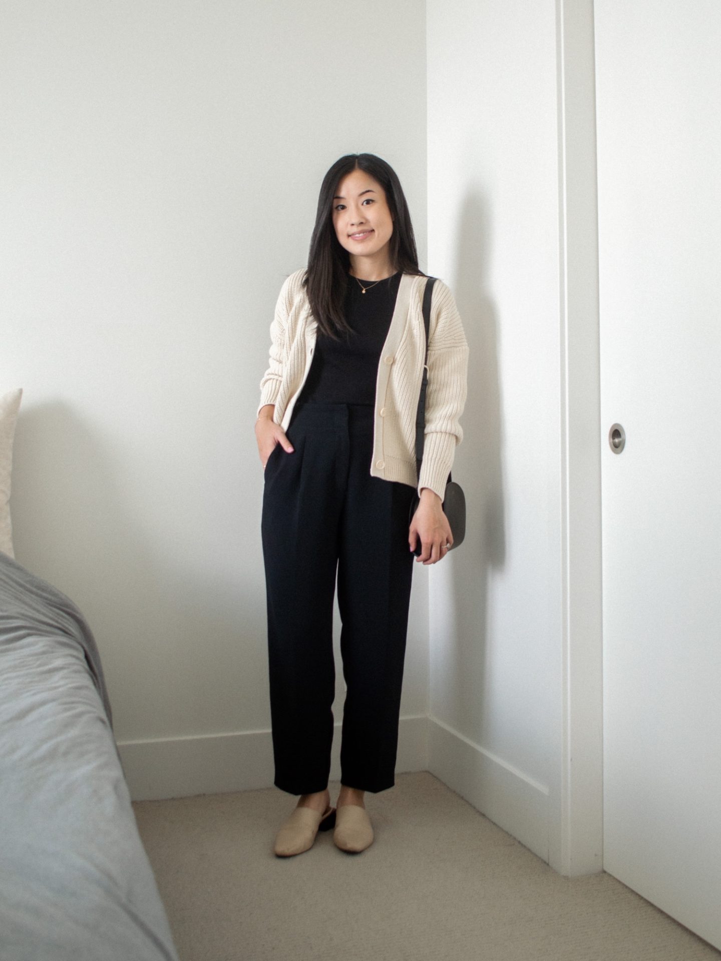 Her Simple Sole outfit details: Oversized cardigan with black base, black tank top and trousers outfit, neutral style, monochrome black outfit base, fall transition outfit