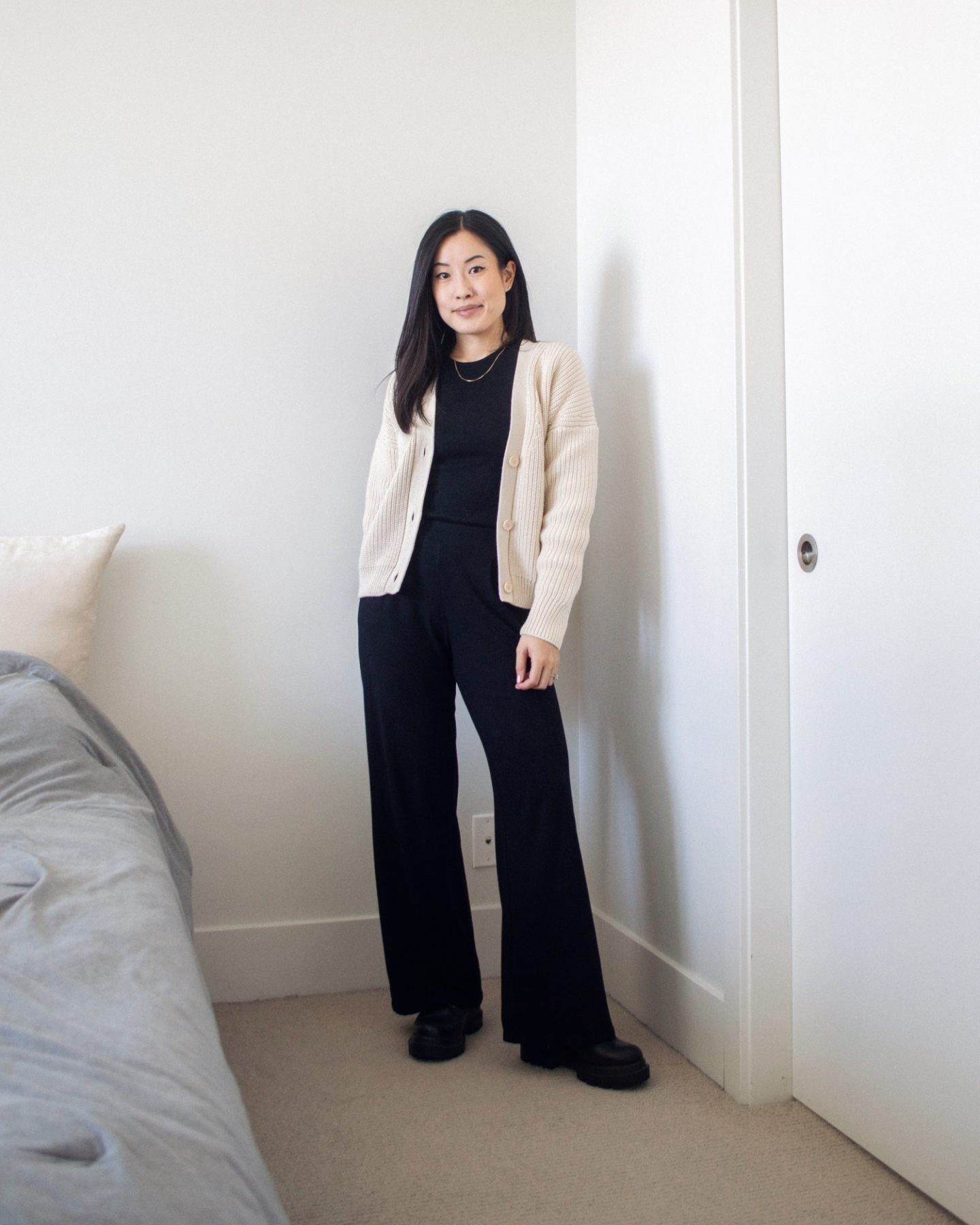 Outfit details - chunky cotton knit cardigan, black high neck tank top, black wide leg pants, black combat boots, black base outfit, black monochrome outfit