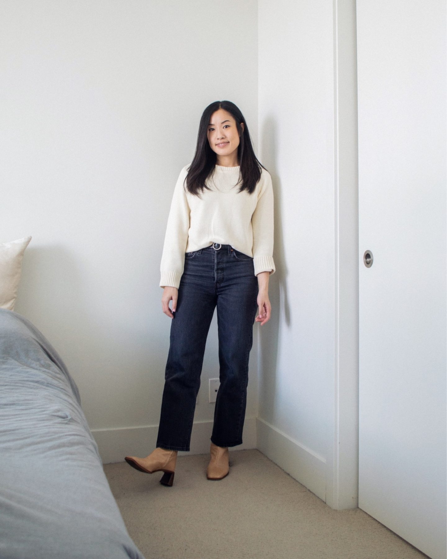 Outfit details - organic cotton sweater, dark grey straight leg jeans, nude ankle boots