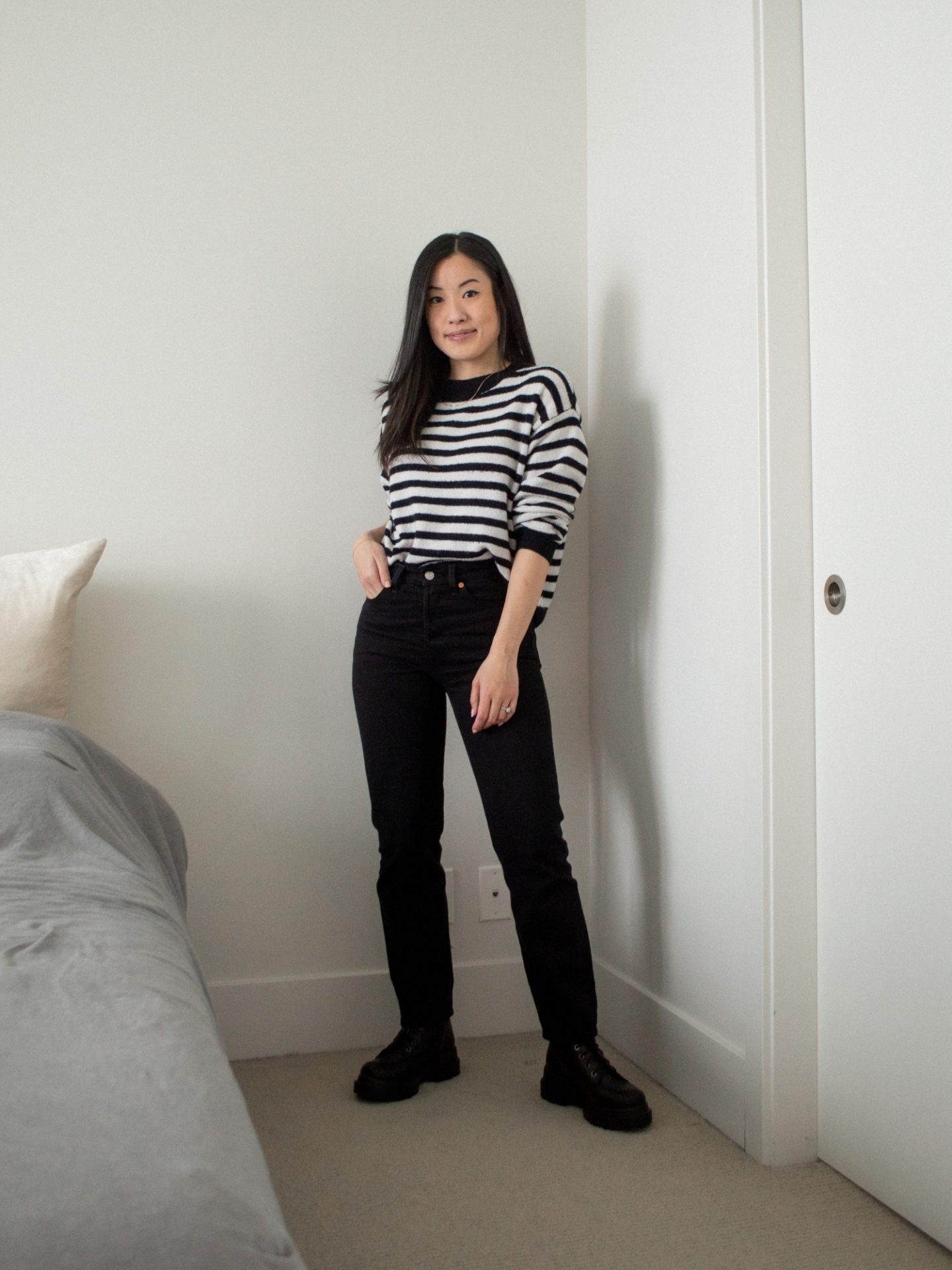 Monochrome outfit for fall, fall styling, black and white striped sweater, black straight leg jeans, combat boots