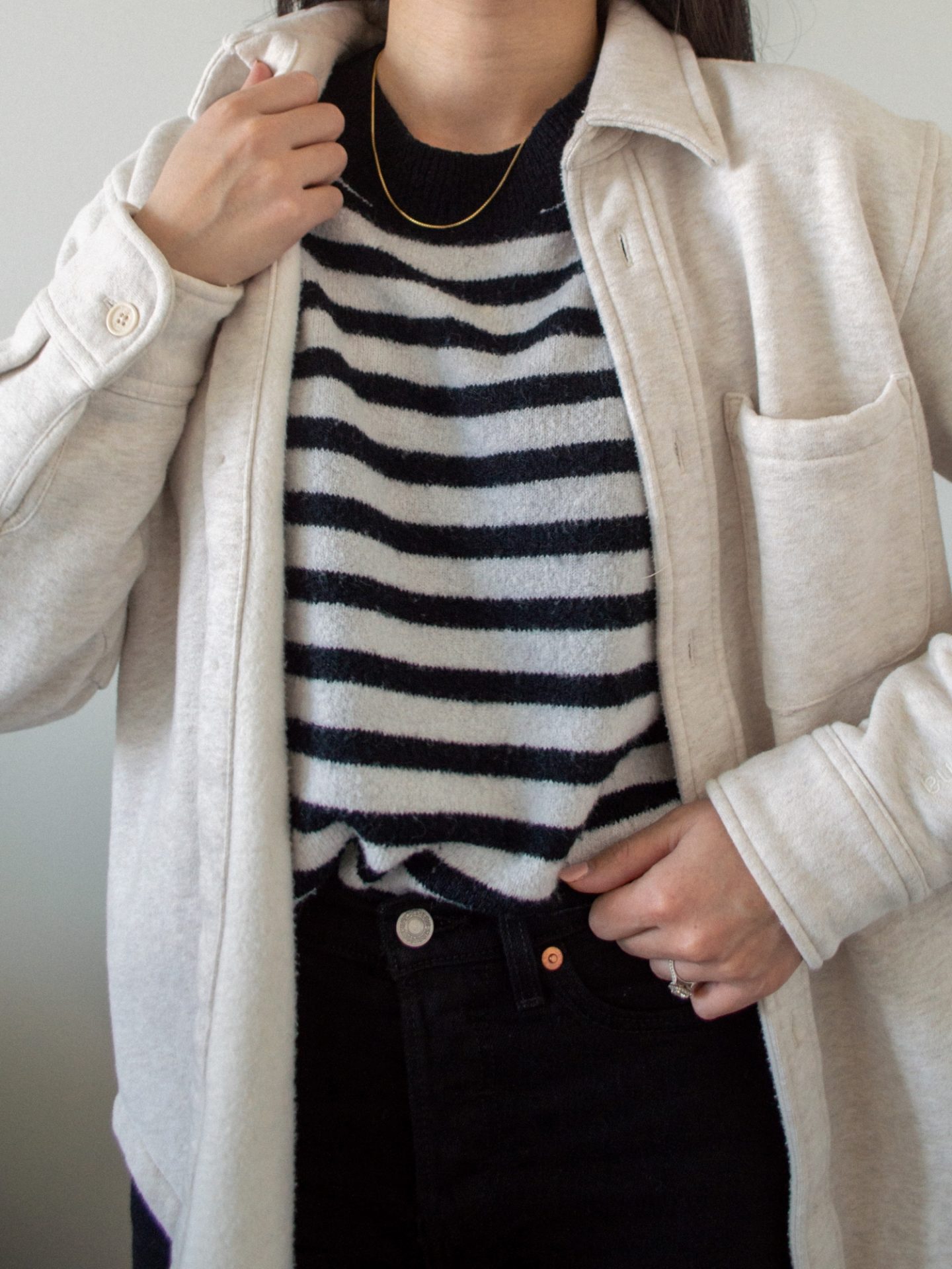 Monochrome outfit for fall, fall styling, black and white striped sweater, black straight leg jeans, combat boots