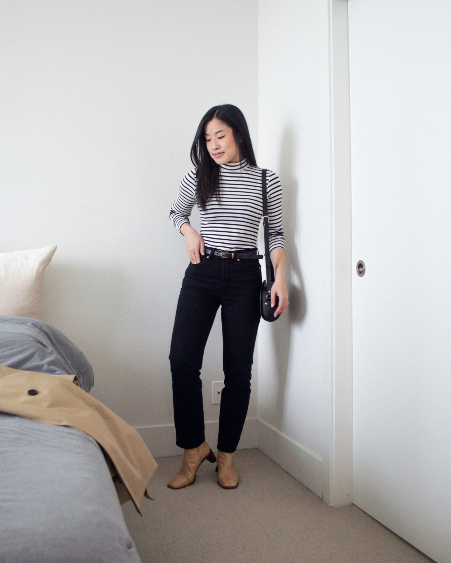 Outfit details - Everlane The Modern Trench Coat, black and white stripe turtleneck t-shirt, Levi's Wedgie Straight Leg Jeans, L'intervalle Dundee Nude Leather Boots, A.P.C. Black Demi-Lune Bag