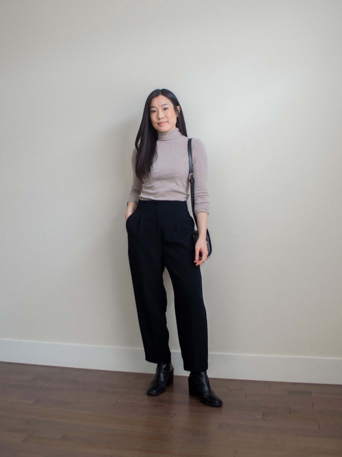 Her Simple Sole - A Recap: Shop Your Winter Wardrobe Style Challenge. Outfit details: taupe turtleneck top, black trousers, black mid-calf boots, black half moon bag. Her Simple Sole blog, chic winter outfit idea, fitted turtleneck outfit