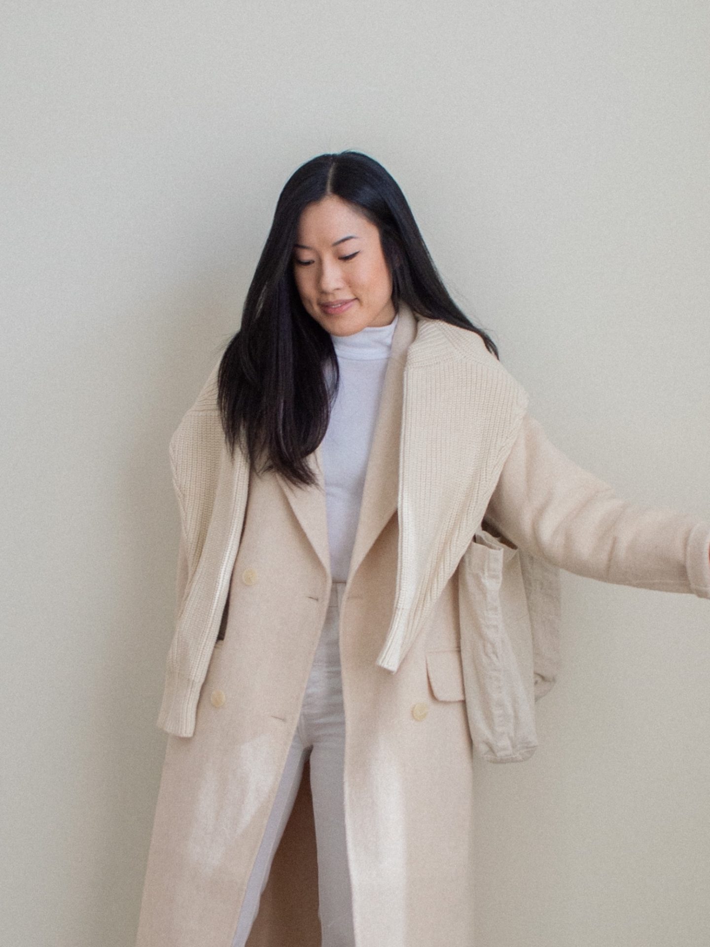 Outfit details: white turtleneck top, white straight leg jeans, cream wool coat, cream knitted cotton cardigan, linen tote bag. Her Simple Sole blog, white monochrome outfit, light colored winter outfit