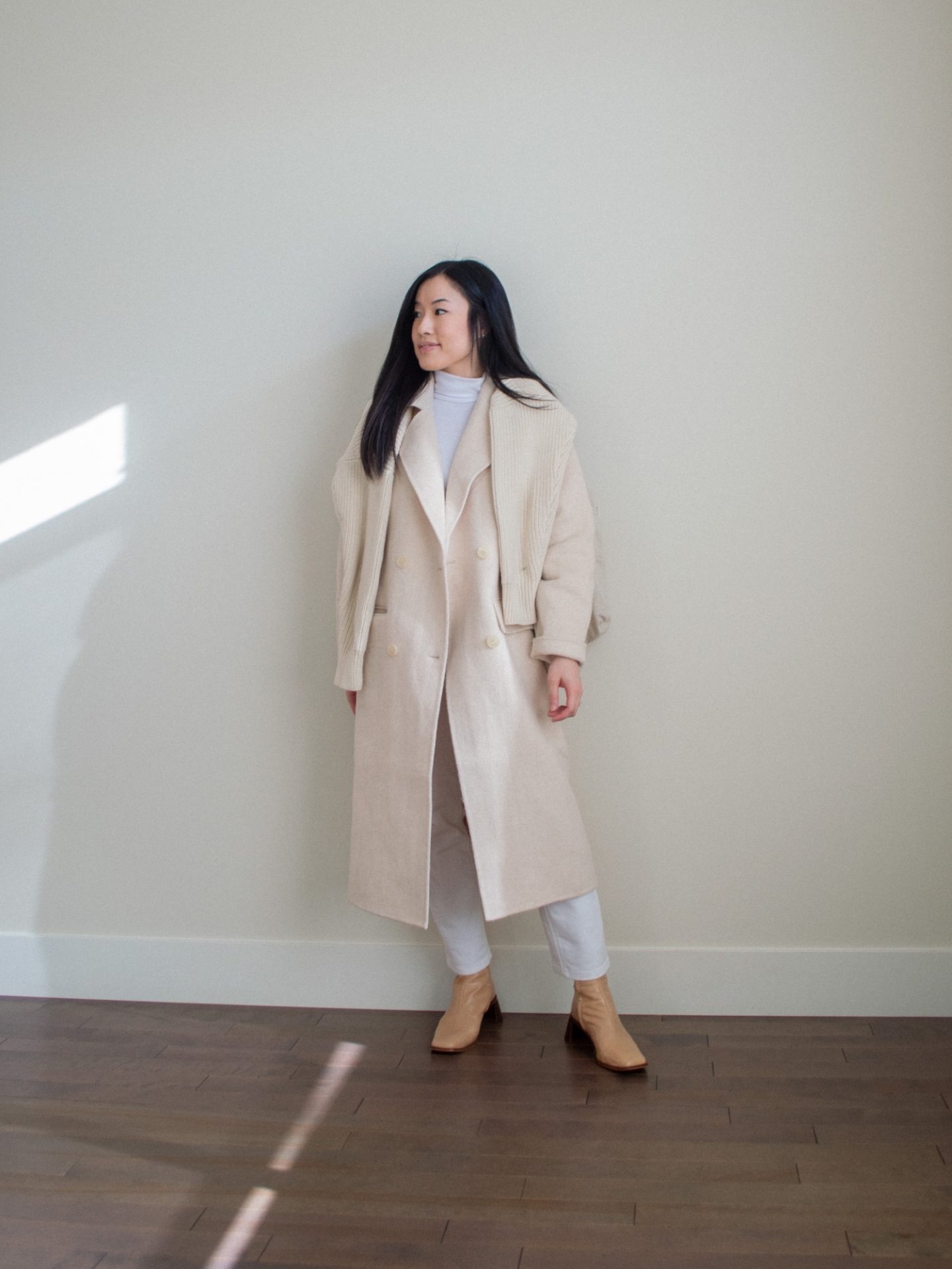 Her Simple Sole - A Recap: Shop Your Winter Wardrobe Style Challenge. Outfit details: white turtleneck top, white straight leg jeans, cream wool coat, cream knitted cotton cardigan, linen tote bag, nude ankle boots. Her Simple Sole blog, white monochrome outfit, light colored winter outfit