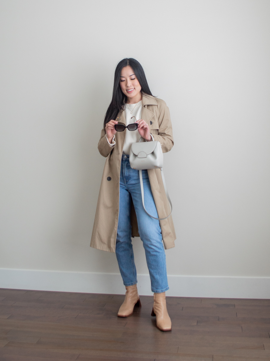 Her Simple Sole outfit photo featuring Everlane The Modern Trench Coat and Original Cheeky Jeans, Able Clothing Lily Pullover Sweater, Lintervalle ankle boots, Polène Numéro Un Nano (Number One Nano), and Burberry sunglasses