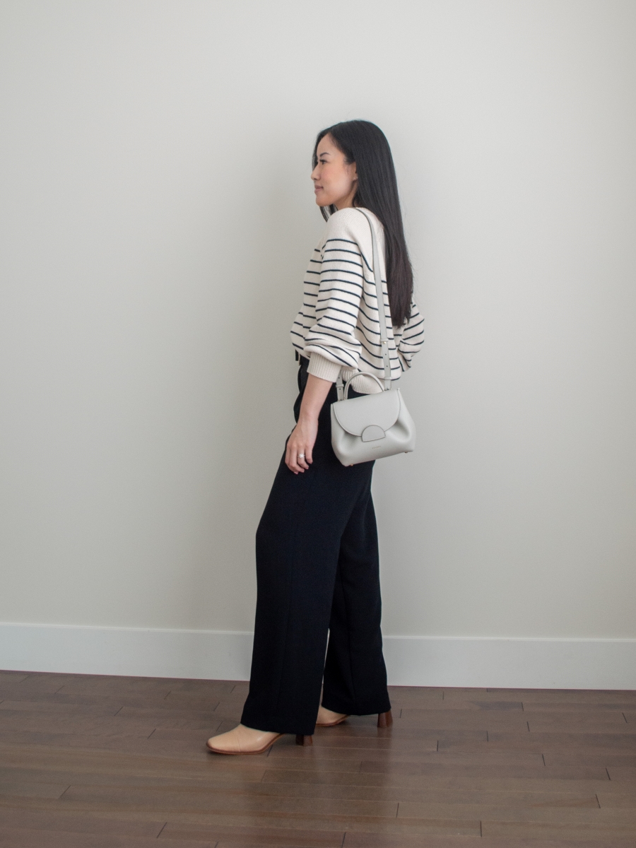 100% organic cotton sweater, stripe cotton sweater, black wide leg trousers, off-white crossbody bag, beige ankle boots, white basic tank top outfit, fall outfit idea, simple and chic outfit idea