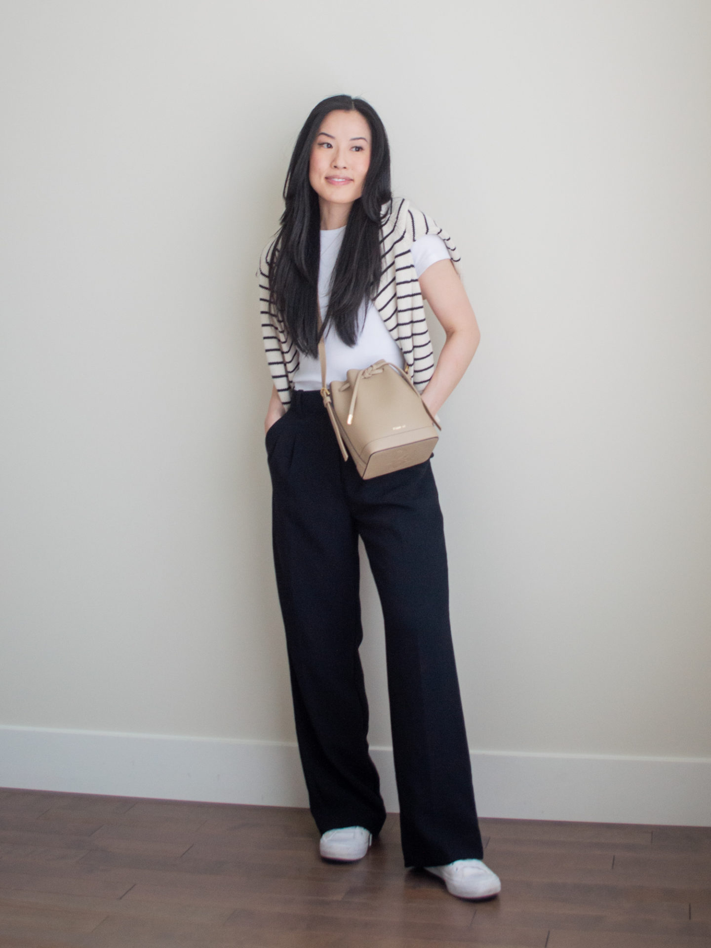 Sharon of Her Simple Sole showcases some of her favourite easy spring outfits that anyone can recreate using minimal, comfortable, and functional items from her intentional wardrobe | spring outfit ideas | minimalist outfit ideas | sweater over the shoulders outfit | t-shirt and pants outfit | smart casual outfit