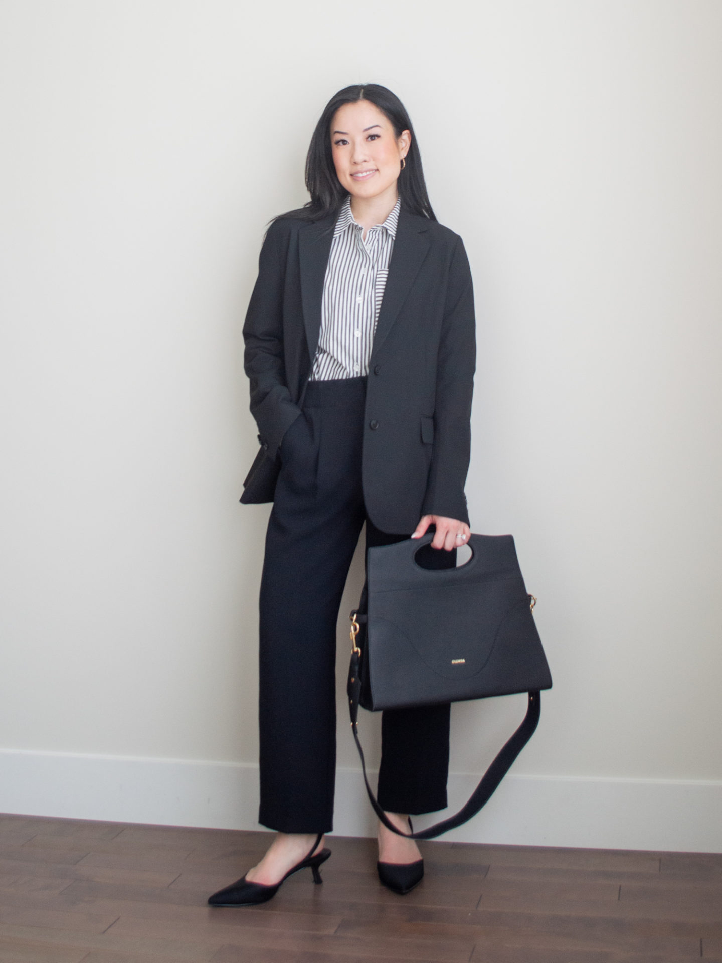 Sharon of Her Simple Sole showcases some of her favourite easy spring outfits that anyone can recreate using minimal, comfortable, and functional items from her intentional wardrobe | spring outfit ideas | minimalist outfit ideas | workwear style | black blazer and button up shirt outfit | business office fashion