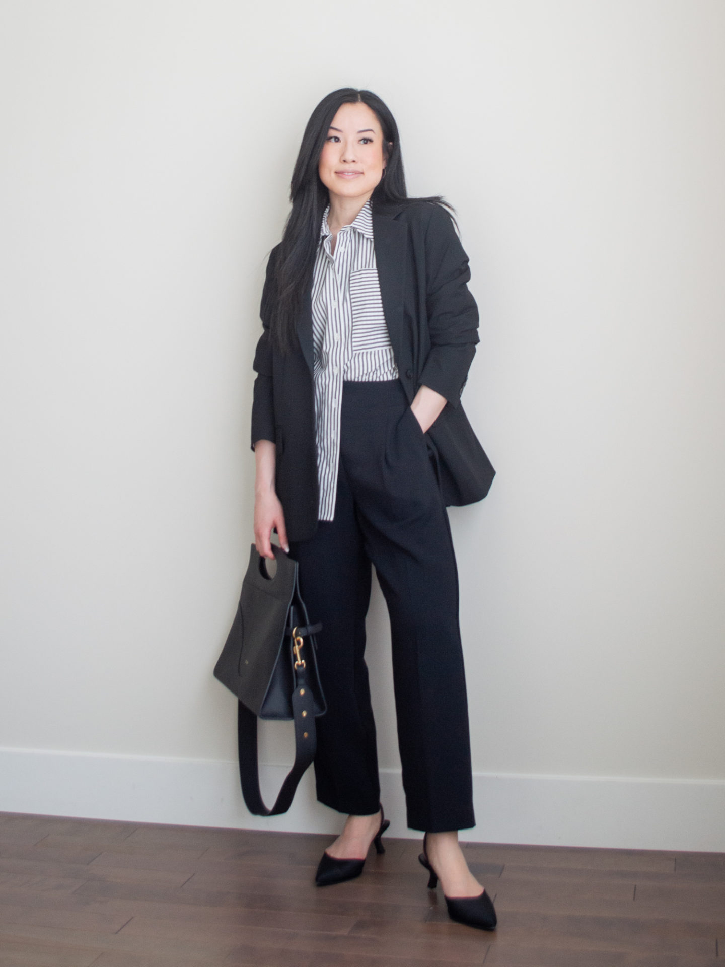 Sharon of Her Simple Sole showcases some of her favourite easy spring outfits that anyone can recreate using minimal, comfortable, and functional items from her intentional wardrobe | spring outfit ideas | minimalist outfit ideas | workwear style | black blazer and button up shirt outfit | business office fashion