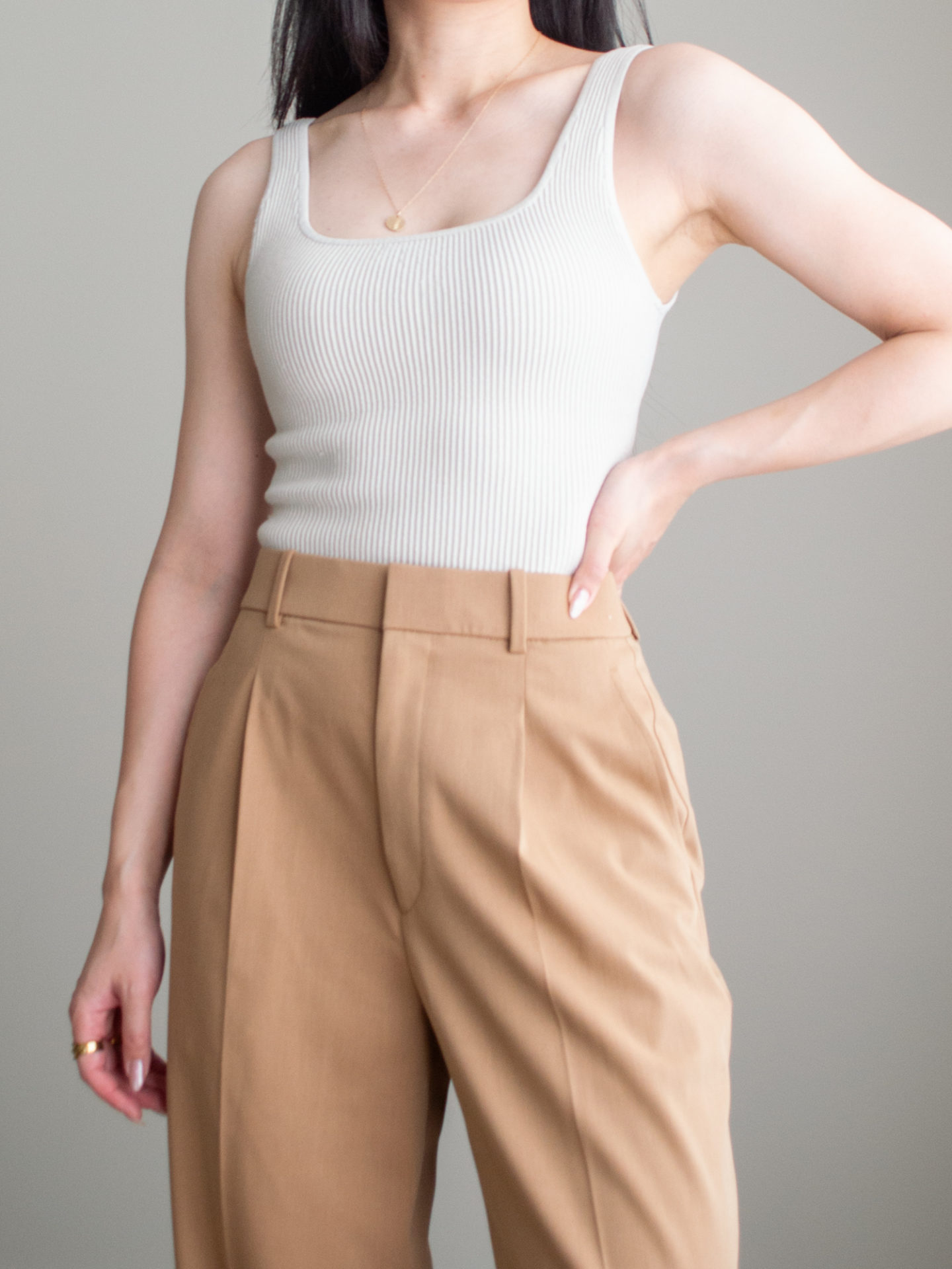 Close-up detailed outfit shot of Sharon of Her Simple Sole wearing a square neck tank top and brown wide leg pants | minimalist outfit ideas | smart casual outfit